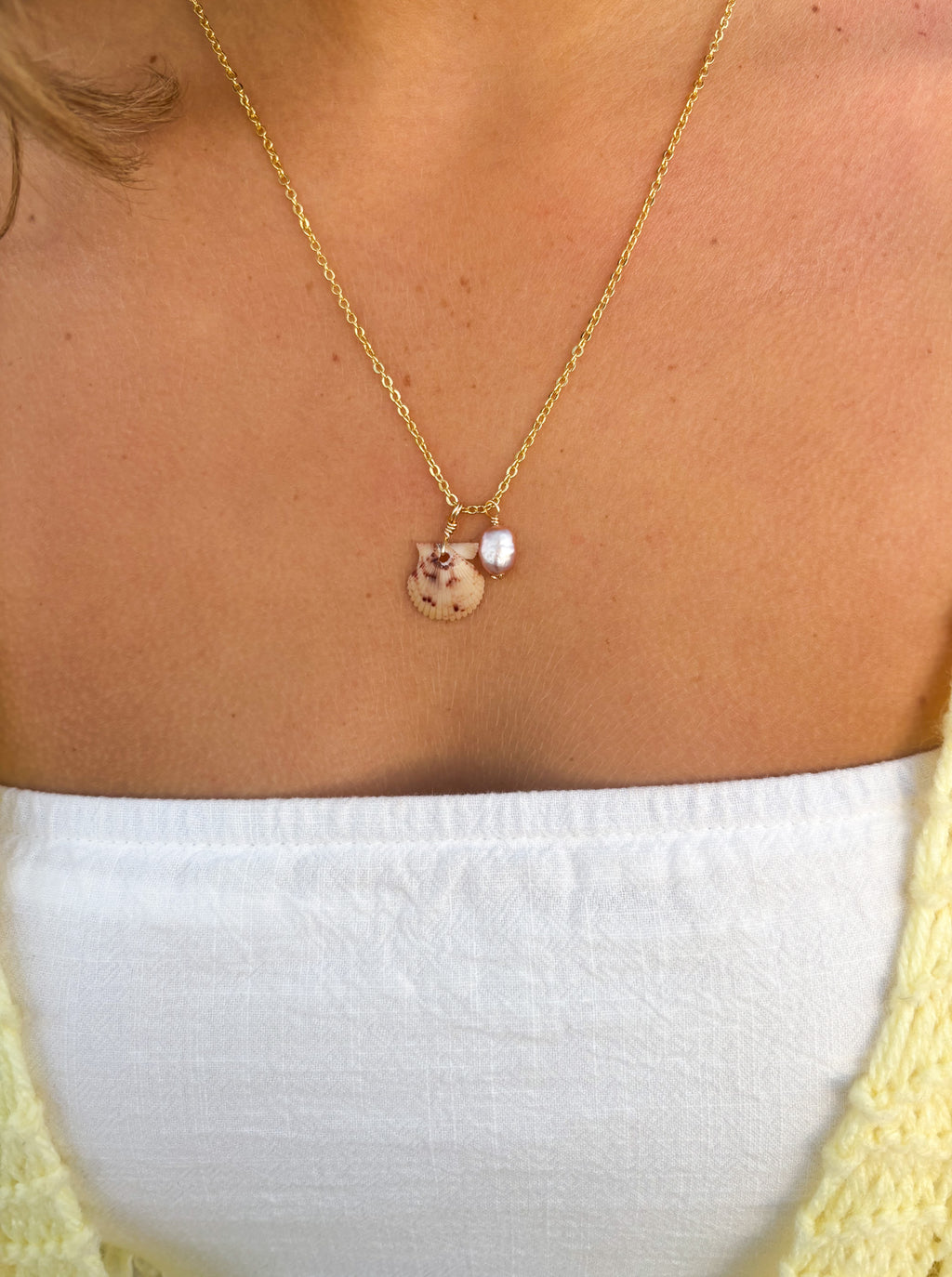 Blush Harbor Shell Necklace beach jewelry with calico scallop shell and freshwater pearl charm on gold chain