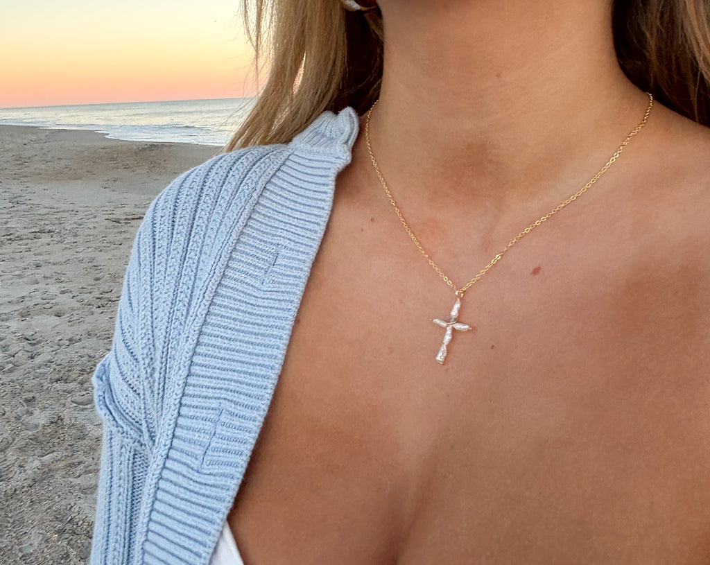 Dainty Pearl Cross Necklace handcrafted handmade jewelry worn at the beach with pearl cross pendant