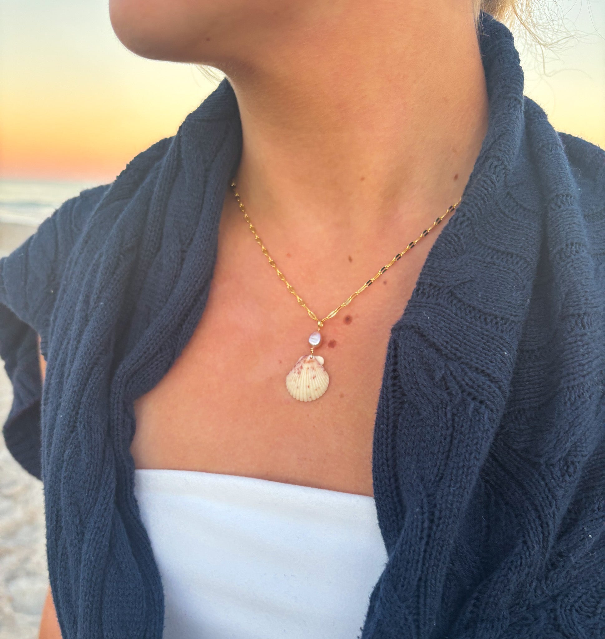 Rosie Bay coastal shell necklace handcrafted handmade jewelry worn at sunset beach