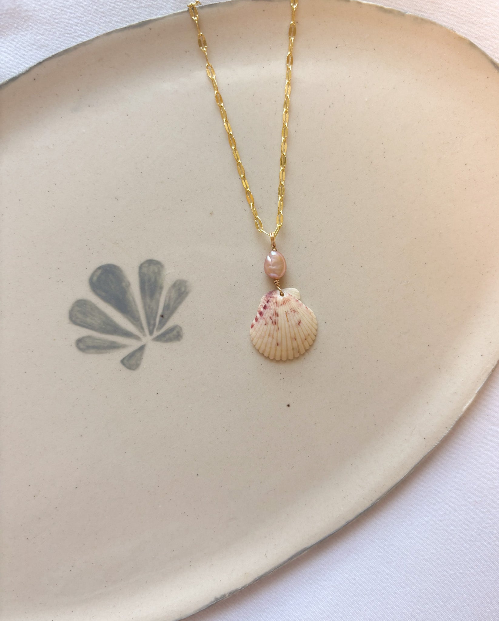 Rosie Bay scallop shell necklace handcrafted handmade jewelry with real calico scallop shell pendant